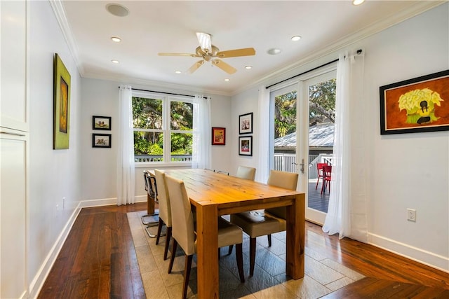 dining area featuring crown molding, hardwood / wood-style floors, and ceiling fan