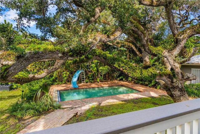 view of home's community featuring a swimming pool