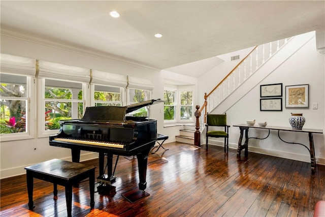 miscellaneous room with ornamental molding and hardwood / wood-style floors