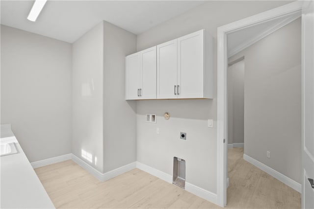 laundry area with hookup for an electric dryer, light hardwood / wood-style flooring, washer hookup, and gas dryer hookup