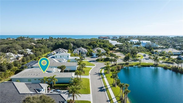 aerial view featuring a water view