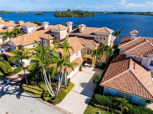 birds eye view of property featuring a water view