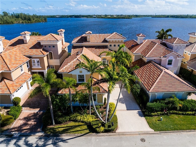 bird's eye view with a water view