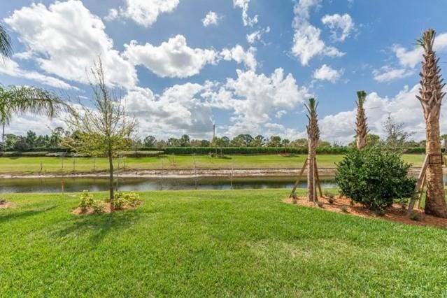 view of yard with a water view