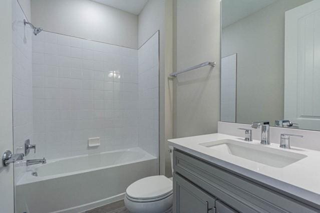 full bathroom featuring vanity, toilet, and shower / bathing tub combination