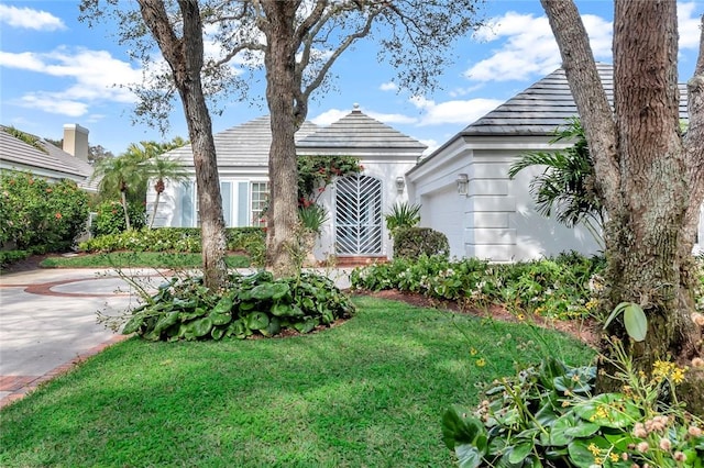 view of front of home with a front yard