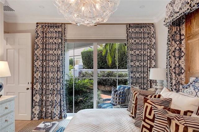 bedroom with ornamental molding and a notable chandelier