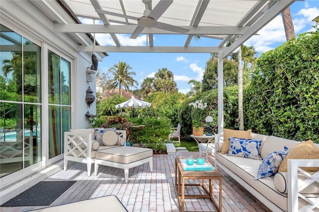 sunroom / solarium with ceiling fan