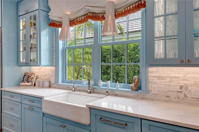 kitchen featuring sink and backsplash