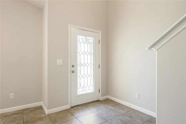 8157 Westfield Cir, Vero Beach, FL 32966 - entryway with light tile patterned flooring and baseboards