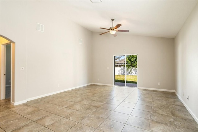 8157 Westfield Cir, Vero Beach, FL 32966 - spare room featuring arched walkways, ceiling fan, light tile patterned floors, visible vents, and baseboards