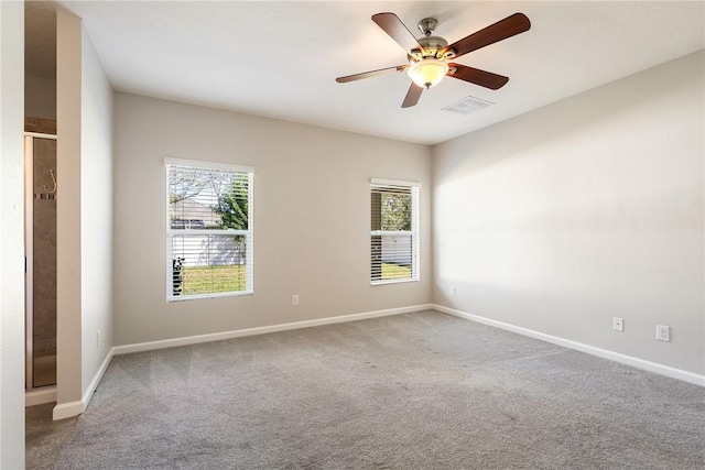 8157 Westfield Cir, Vero Beach, FL 32966 - empty room featuring ceiling fan, carpet, visible vents, and baseboards