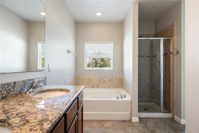 8157 Westfield Cir, Vero Beach, FL 32966 - full bathroom featuring a garden tub, plenty of natural light, a shower stall, and vanity