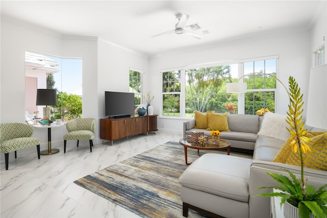 living room featuring ceiling fan and crown molding