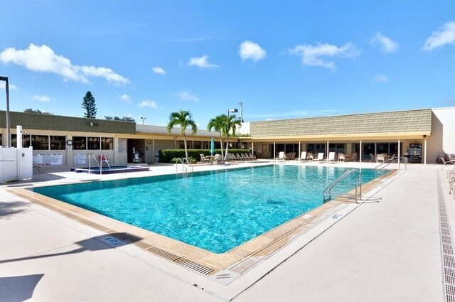 view of pool featuring a patio