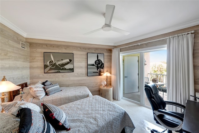 bedroom featuring ceiling fan, crown molding, carpet, and access to outside