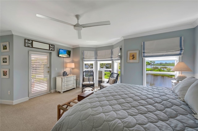 carpeted bedroom with multiple windows, crown molding, ceiling fan, and access to exterior