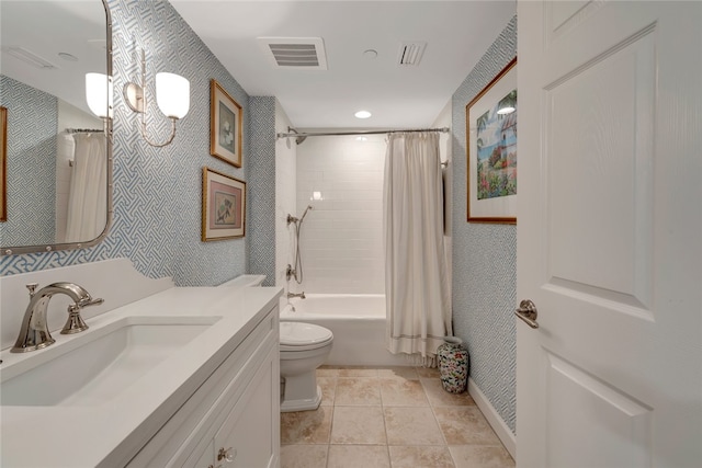 full bathroom featuring shower / tub combo with curtain, vanity, toilet, and tile patterned flooring