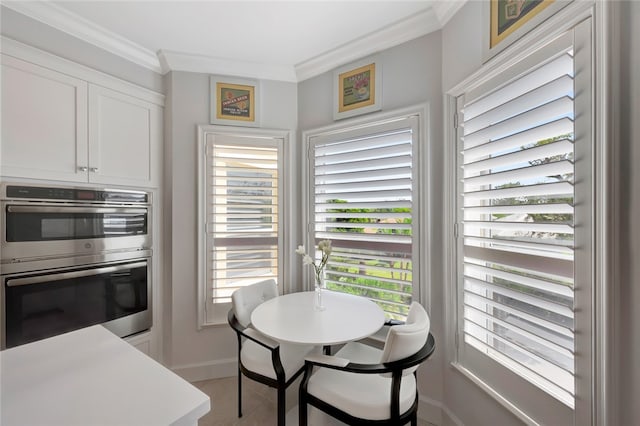 dining room featuring ornamental molding