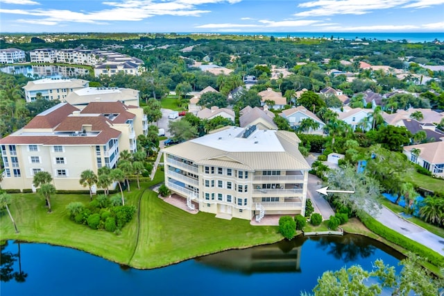 drone / aerial view with a water view