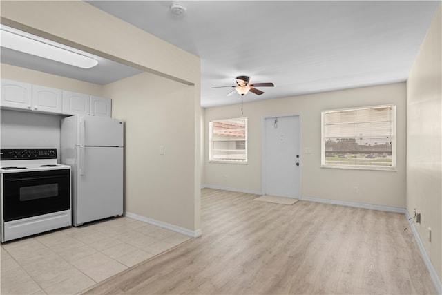 kitchen with white cabinetry, light hardwood / wood-style flooring, ceiling fan, and white appliances