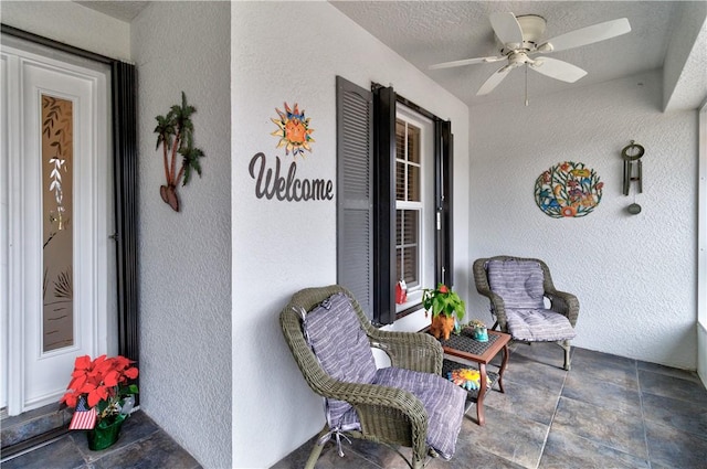 view of patio with ceiling fan