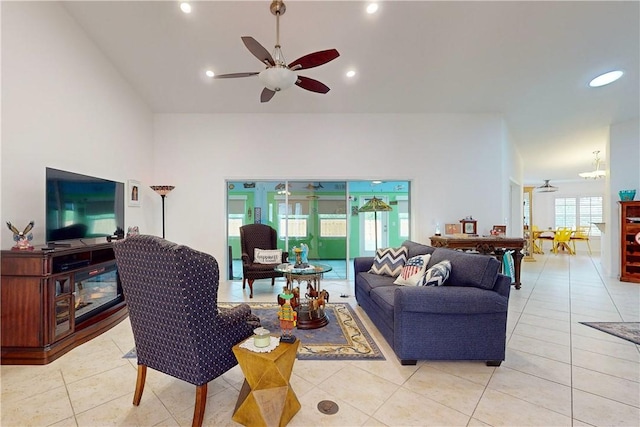 tiled living room with ceiling fan