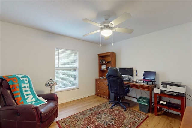 office area featuring ceiling fan and light wood-type flooring