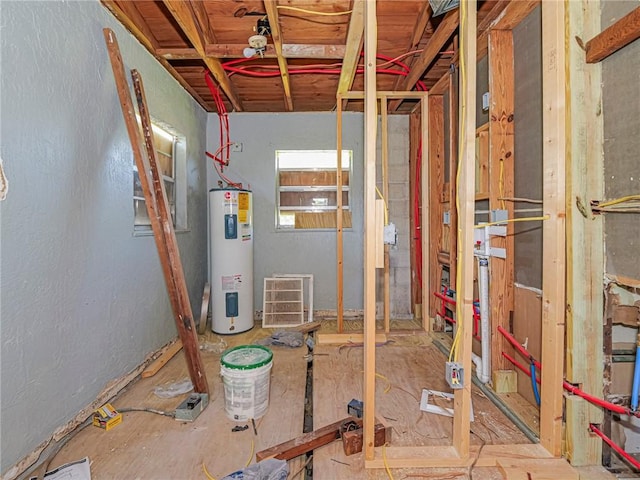 utility room featuring electric water heater