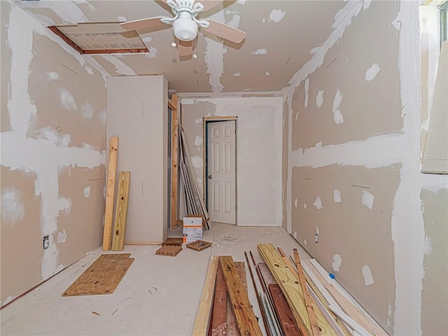 interior space featuring a ceiling fan