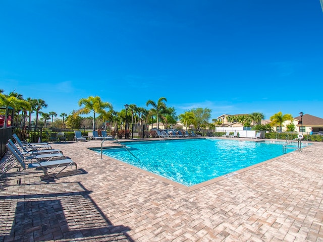 view of pool featuring a patio area