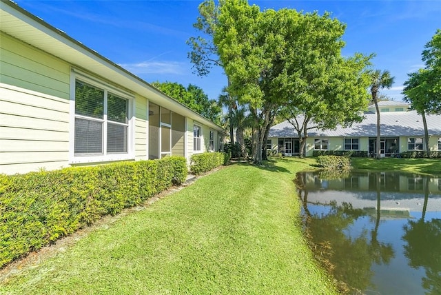 view of yard featuring a water view