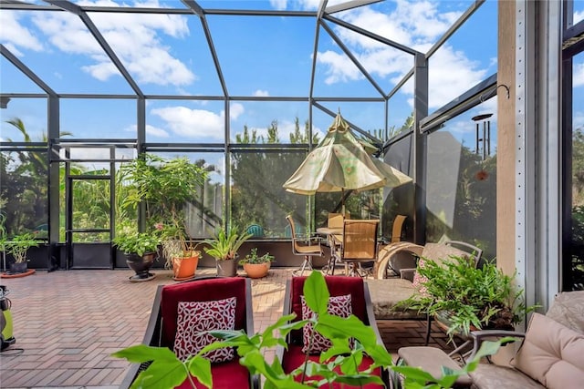 view of patio / terrace with a lanai