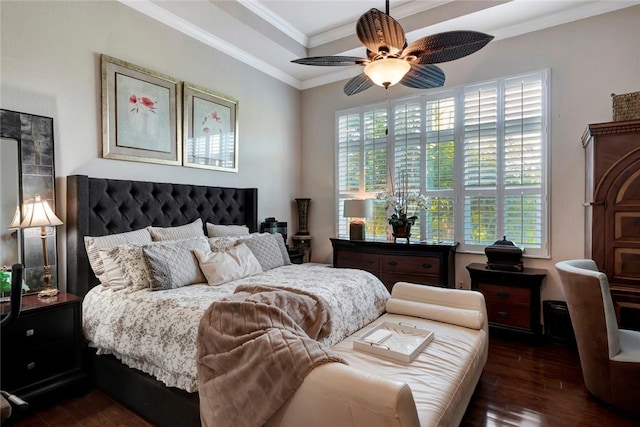 bedroom with ceiling fan, ornamental molding, and dark wood-type flooring