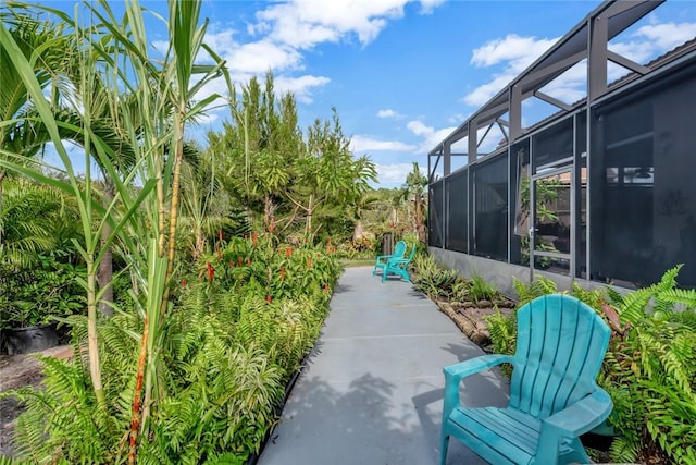 view of patio / terrace with a lanai