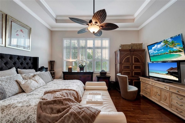 bedroom featuring a raised ceiling, ceiling fan, crown molding, and dark hardwood / wood-style floors