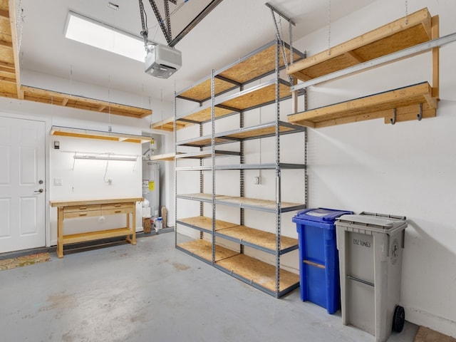 garage with water heater and a garage door opener