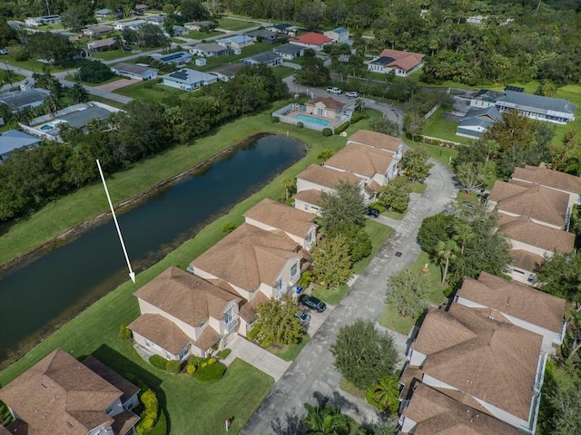 aerial view featuring a residential view and a water view