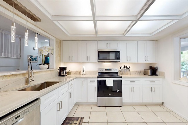 kitchen featuring stainless steel appliances, sink, and white cabinets