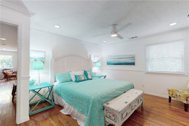 bedroom with ceiling fan and light wood-type flooring