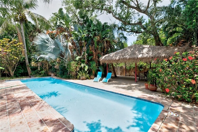 view of swimming pool featuring a gazebo and a patio area