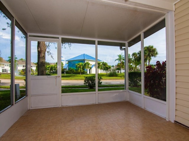 unfurnished sunroom with a healthy amount of sunlight