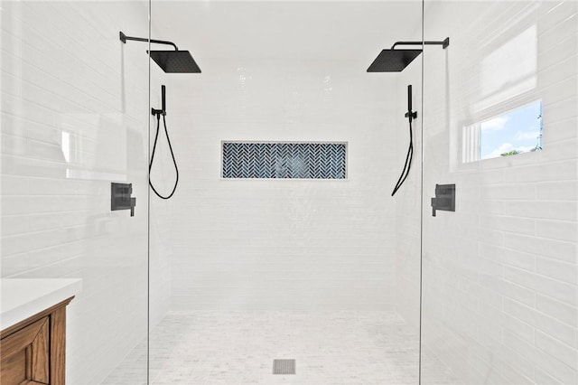 9670 Riverview Dr, Micco, FL 32976 - bathroom featuring a walk in shower and vanity