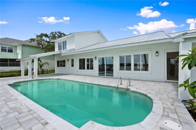 9670 Riverview Dr, Micco, FL 32976 - outdoor pool with a patio area