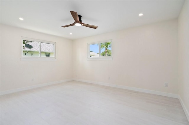 9670 Riverview Dr, Micco, FL 32976 - empty room featuring recessed lighting, a ceiling fan, and light wood-style flooring