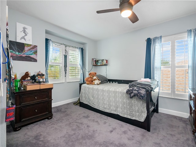 bedroom with ceiling fan and light colored carpet