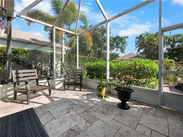 unfurnished sunroom featuring a healthy amount of sunlight