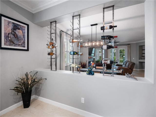 kitchen featuring hanging light fixtures and ornamental molding