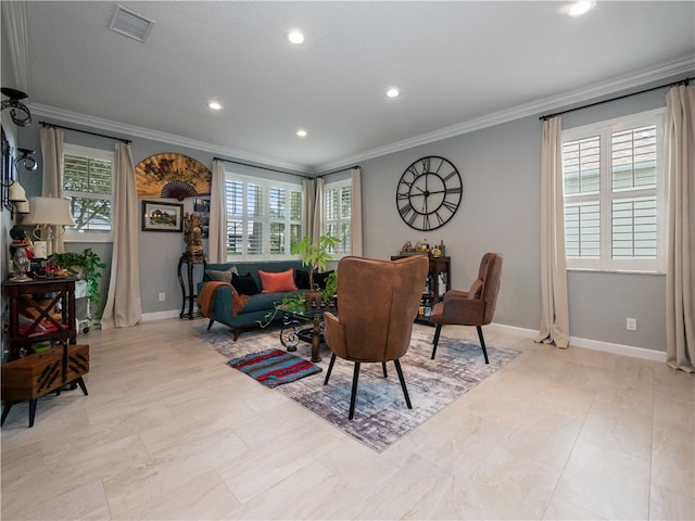 living room with a healthy amount of sunlight and crown molding