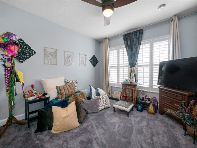 carpeted bedroom with ceiling fan